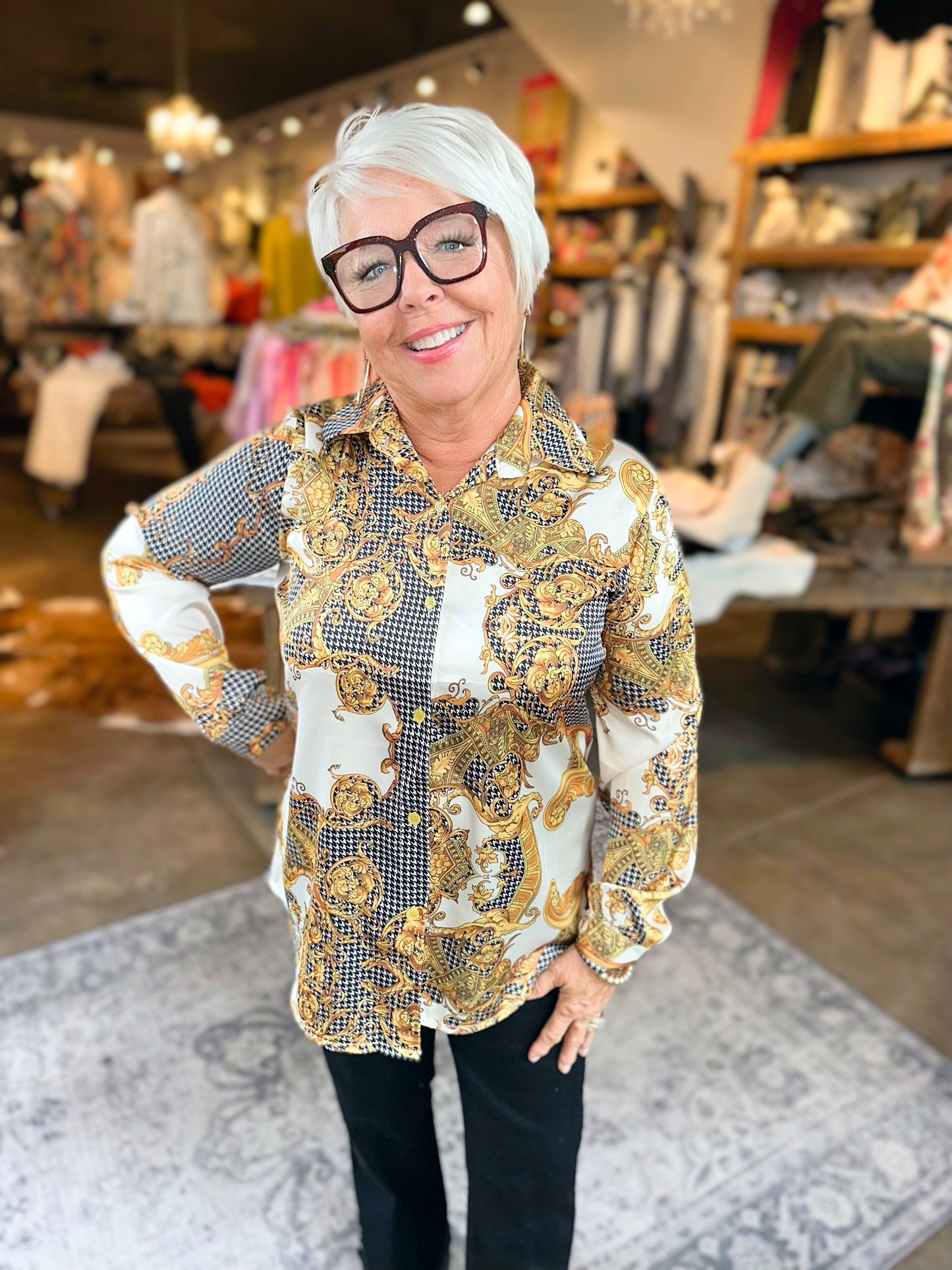 black and gold long sleeved button down collar shirt