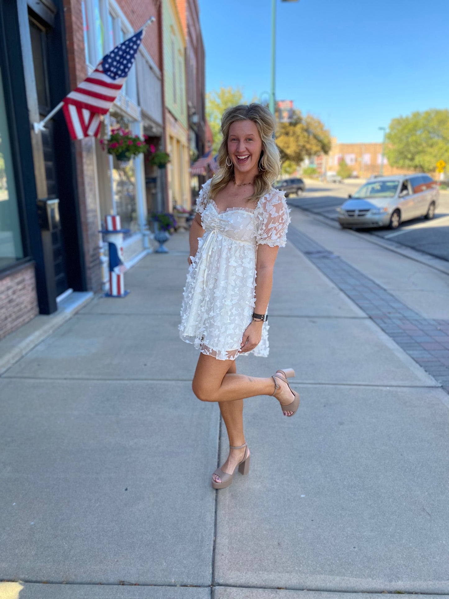 cream babydoll mini dress with butterflies