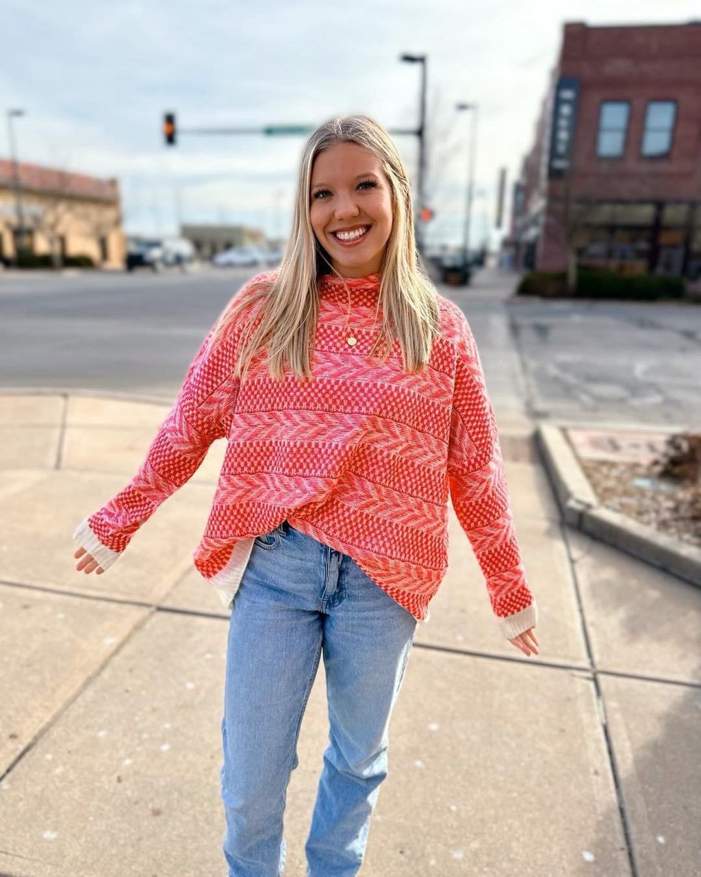 pink patterned sweater